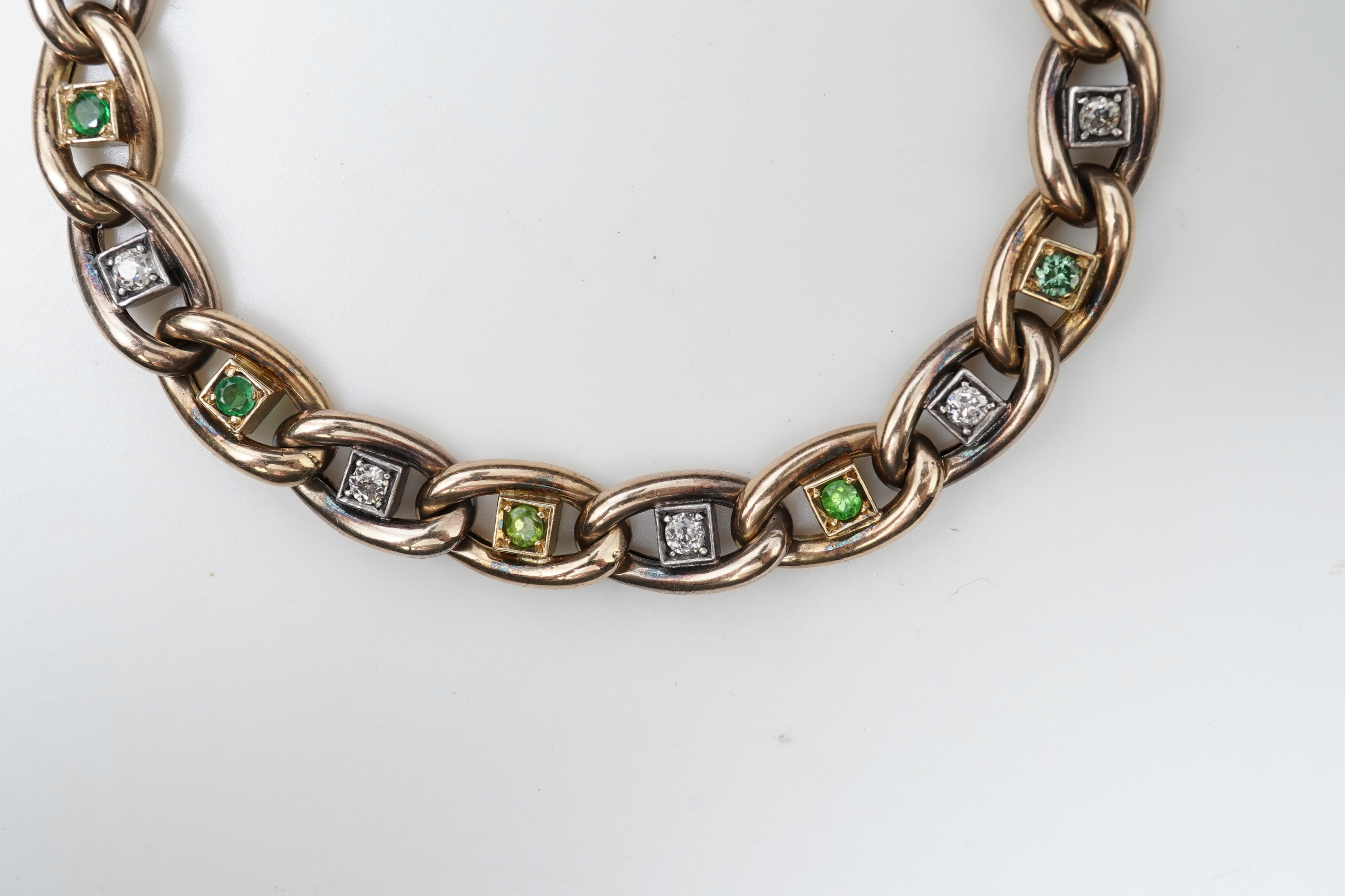 A demantoid garnet and diamond bracelet, early 20th century